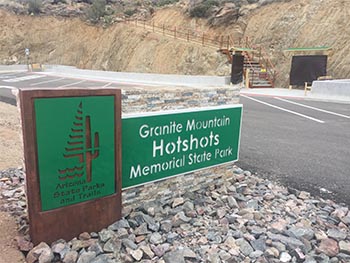 The park sign at the parking lot