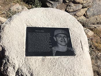 One of the plaques inset in a rock along the trail