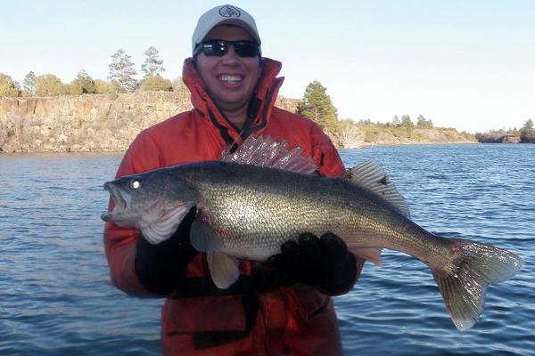 Arizona Walleye fishing at Fool Hollow Lake. Angler holds a trophy Fool Hollow Lake Walleye.