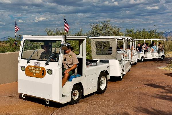 Electric Tram full of passengers.